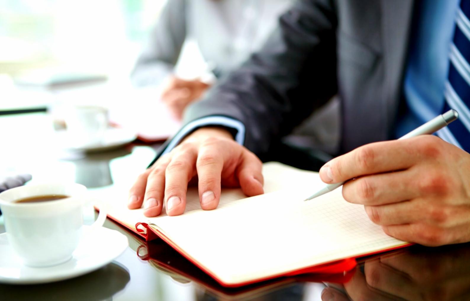 Business professional reviewing financial forecasting reports