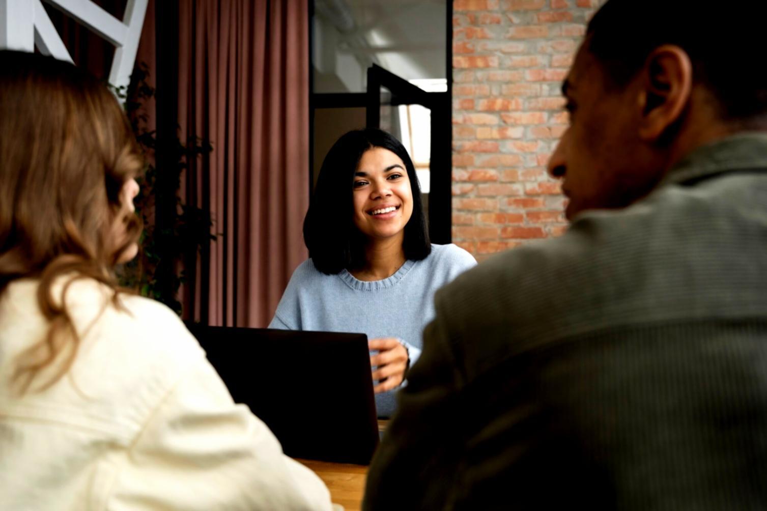 Financial review meeting showing collaborative budgeting process